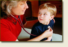 Dr. Cooke with a young patient